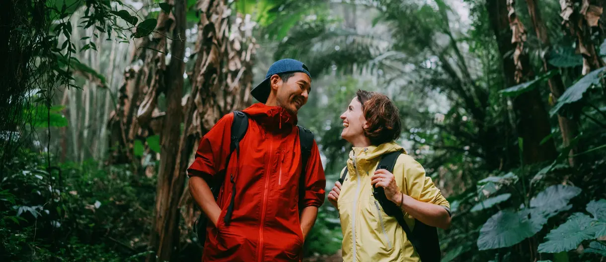 Two people hiking in the forest